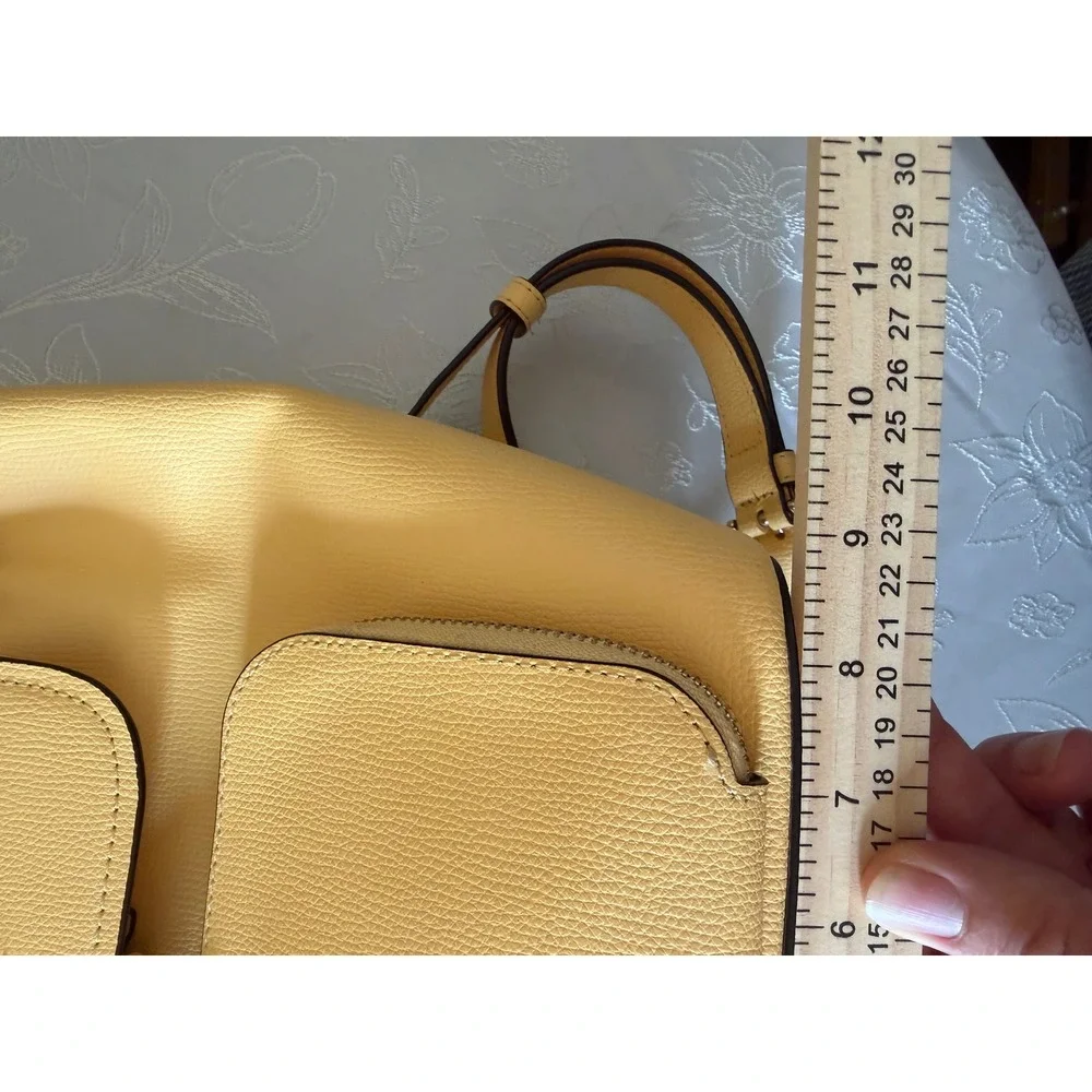 Kate Spade New York Yellow Pebbled Leather Drawstring Backpack Bag